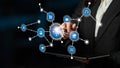 Modern Businessman Interacting with Futuristic Digital Network Interface Showing Icons for E-commerce, Communication Royalty Free Stock Photo
