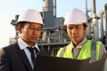 Businessman and engineer oil refinery Royalty Free Stock Photo
