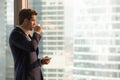 Businessman enjoying morning coffee in office Royalty Free Stock Photo