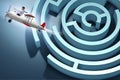 The businessman escaping from maze on airplane