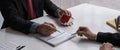 Businessman and estate agent signing a document for house deal Royalty Free Stock Photo