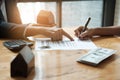 Businessman and estate agent signing a document for house deal, Royalty Free Stock Photo