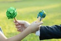 Businessman exchange tree to a boy holding melting Earth. Gyre