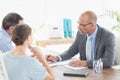 Businessman explaining contract to business partners Royalty Free Stock Photo