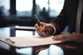 Businessman extends contract to woman for her signature, sealing agreement