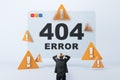 Businessman facing a 404 error message with caution signs. Royalty Free Stock Photo