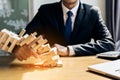 Businessman fail danger tower challenge game Royalty Free Stock Photo