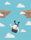 Businessman falling down from cliff or high mountain Royalty Free Stock Photo