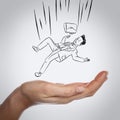 Businessman falling down on hand