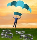 Businessman falling into trap on parachute Royalty Free Stock Photo