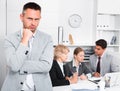Businessman feeling angry to coworkers Royalty Free Stock Photo