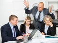 Businessman feeling angry to coworkers in office Royalty Free Stock Photo