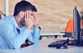 Businessman feeling headache while doing distance work in coffee shop tired with failure of plans