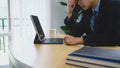 Businessman feeling tired from work and stressful while sitting in office. Royalty Free Stock Photo