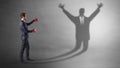 Businessman fighting with a disarmed businessman shadow Royalty Free Stock Photo