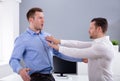 Businessman Fighting With His Colleague In Office Royalty Free Stock Photo