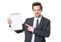 Businessman with finger point wot clipboard Royalty Free Stock Photo