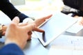 Businessman finger pointing to the screen of tablet-pc Royalty Free Stock Photo