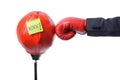 Businessman fist punch punching bag , business concept Royalty Free Stock Photo