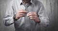 Businessman fixing his tie. Fashion, Lifestyle Royalty Free Stock Photo