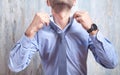 Businessman fixing his tie. Fashion, Lifestyle Royalty Free Stock Photo