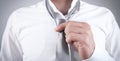 Businessman fixing his tie. Fashion, Lifestyle Royalty Free Stock Photo