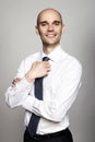 Businessman Fixing His Tie Royalty Free Stock Photo