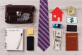 Businessman flatlay on wooden surface.