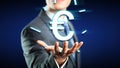 Businessman with a floating euro-symbol