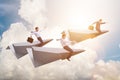 The businessman flying on paper plane in business concept Royalty Free Stock Photo