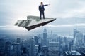 The businessman flying on paper plane in business concept Royalty Free Stock Photo