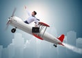 Businessman flying on vintage old airplane Royalty Free Stock Photo