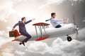 Businessman flying on vintage old airplane Royalty Free Stock Photo