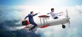 The businessman flying on vintage old airplane Royalty Free Stock Photo