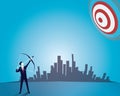 Businessman focus to hit target with bow and arrow