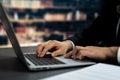 Businessman focused on his laptop working on financial report. Equilibrium Royalty Free Stock Photo