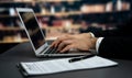 Businessman focused on his laptop working on financial report. Equilibrium Royalty Free Stock Photo