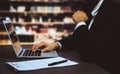 Businessman focused on his laptop working on financial report. Equilibrium Royalty Free Stock Photo