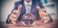 Businessman forecasting a crystal ball