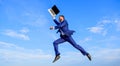 Businessman formal suit fly in air with laptop blue sky background. Heavenly online support. Excellent internet provider Royalty Free Stock Photo