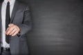 Businessman front of Blackboard Royalty Free Stock Photo