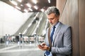 Businessman in front of escalators on a metro station. Royalty Free Stock Photo