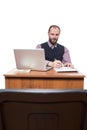 Businessman in front of his desk and laptop Royalty Free Stock Photo