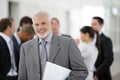 Businessman in front of sales team