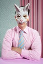 Businessman with funny rabbit mask