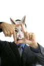 Businessman with funny rabbit mask Royalty Free Stock Photo