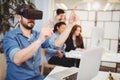 Businessman gesturing while using virtual reality headset Royalty Free Stock Photo