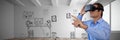 Composite image of businessman gesturing while using virtual reality simulator Royalty Free Stock Photo