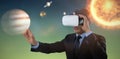 Composite image of businessman gesturing while using vr glasses Royalty Free Stock Photo