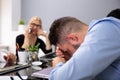 Businessman Getting Disturbed By Phone Calls Of His Partner Royalty Free Stock Photo